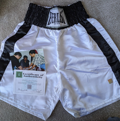 Muhammad ali hand signed - hand, white